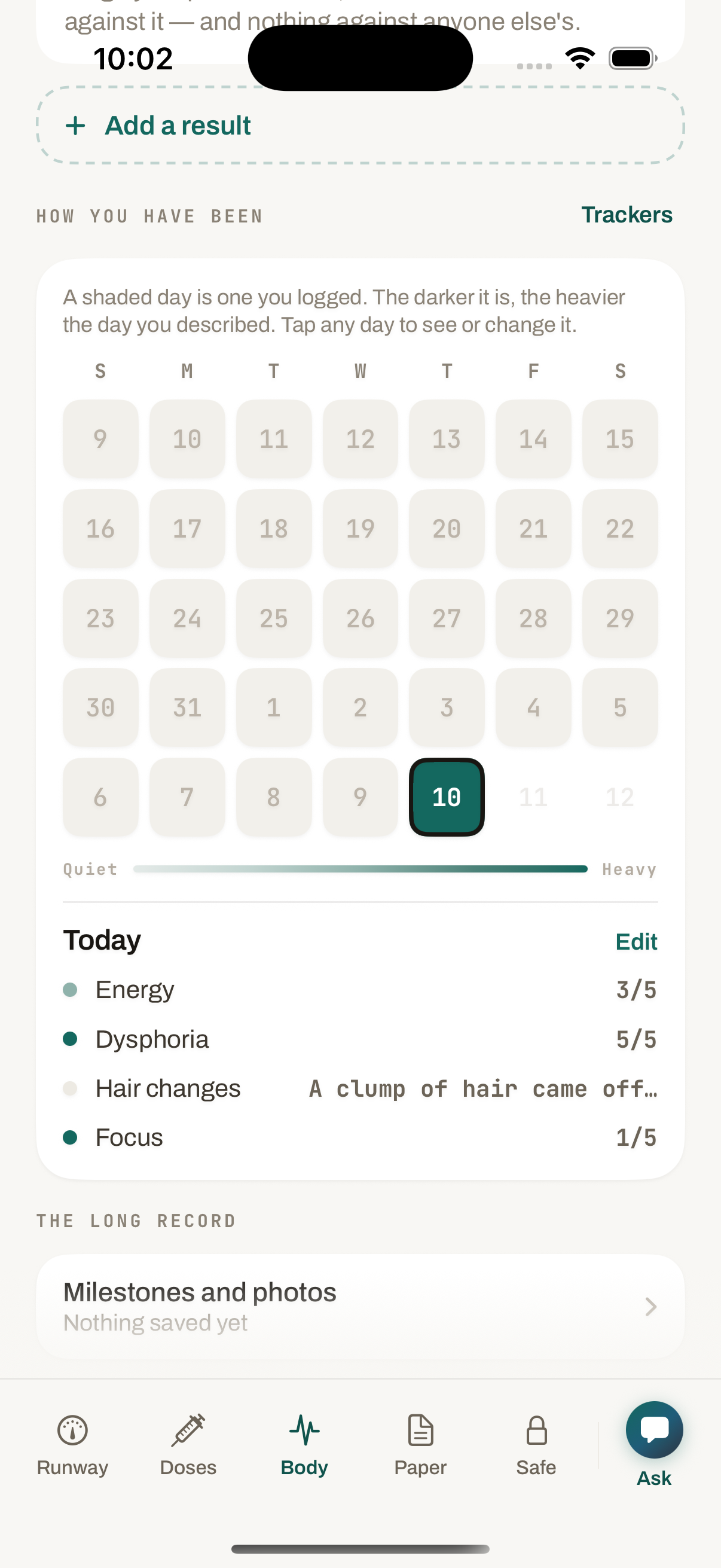 Hormone Helper body tab showing a month of logged days